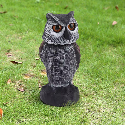 sculpture jardin hibou gris